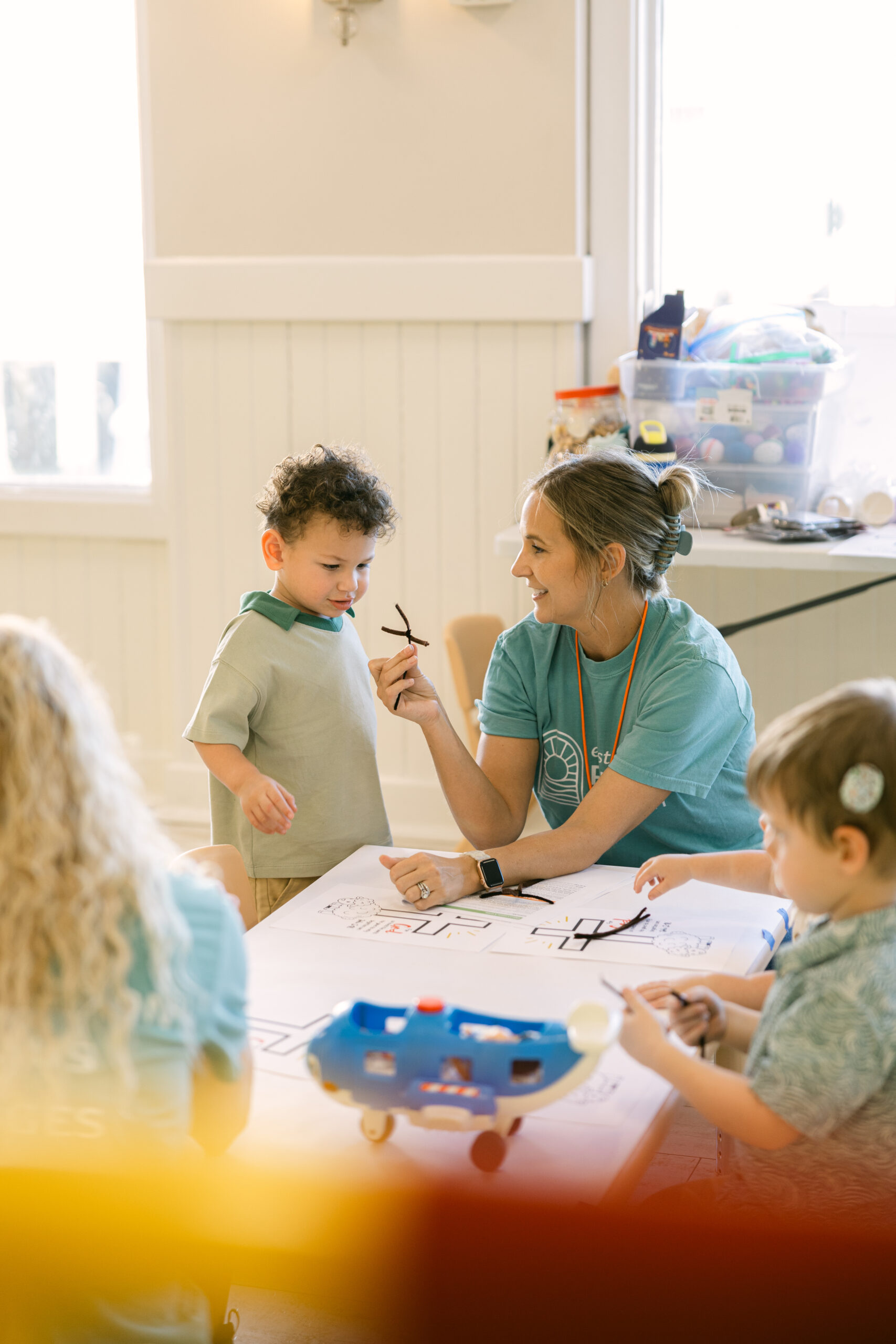 dad holding daughter worshipping